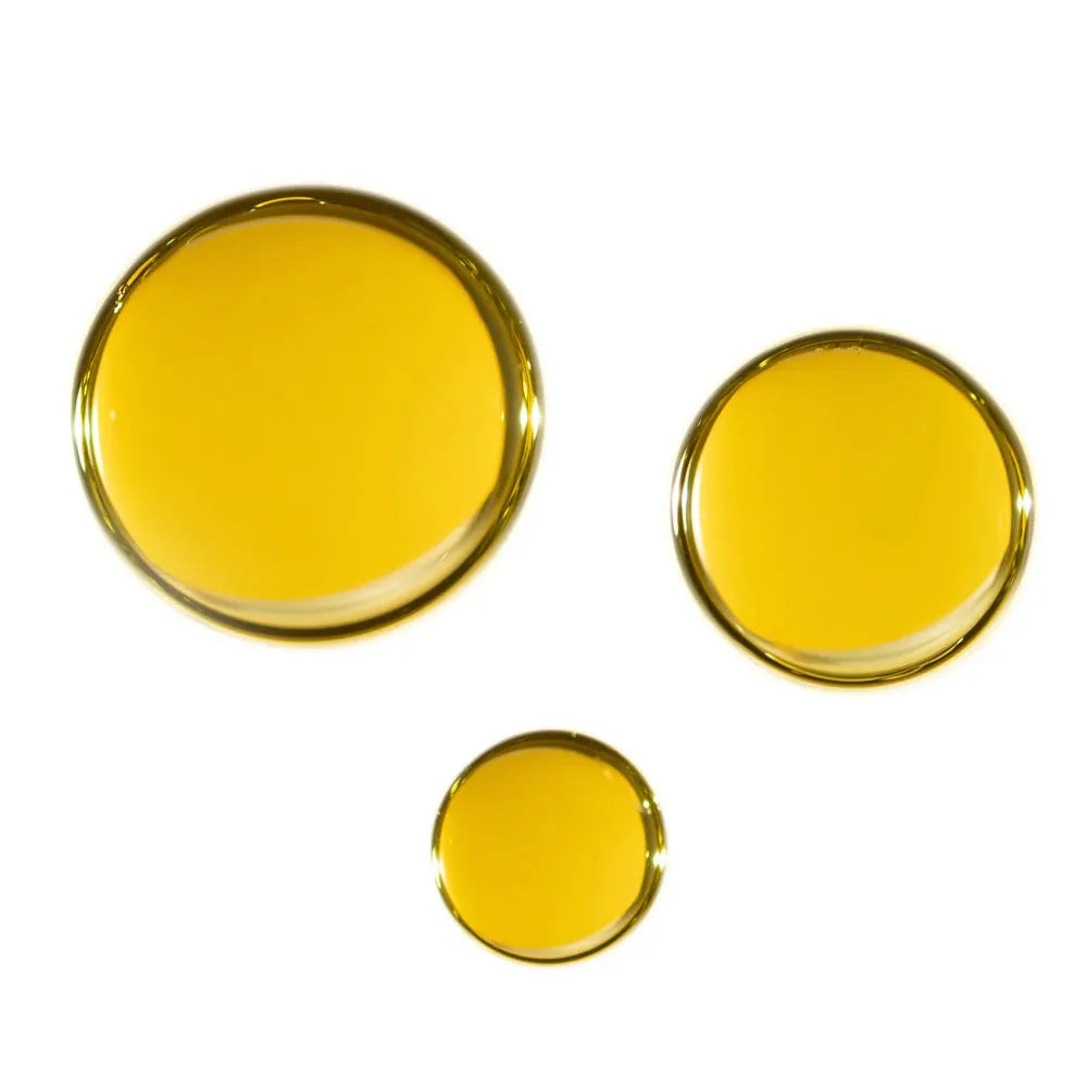 Gocce di olio ricco di tocoferolo vitamina E per la cura naturale della pelle