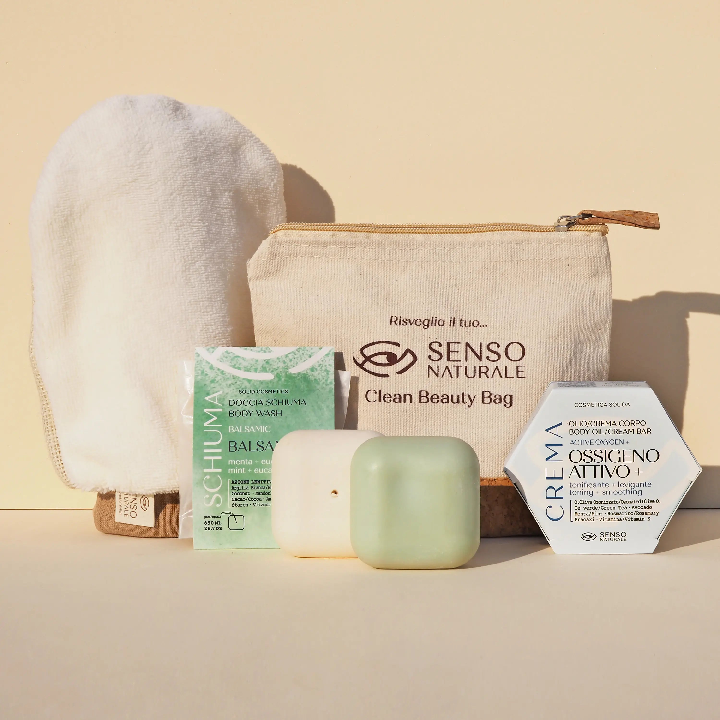 Kit spa rassodante all’ossigeno attivo con olio corpo solido, doccia schiuma naturale, guanto esfoliante e pochette ecologica.