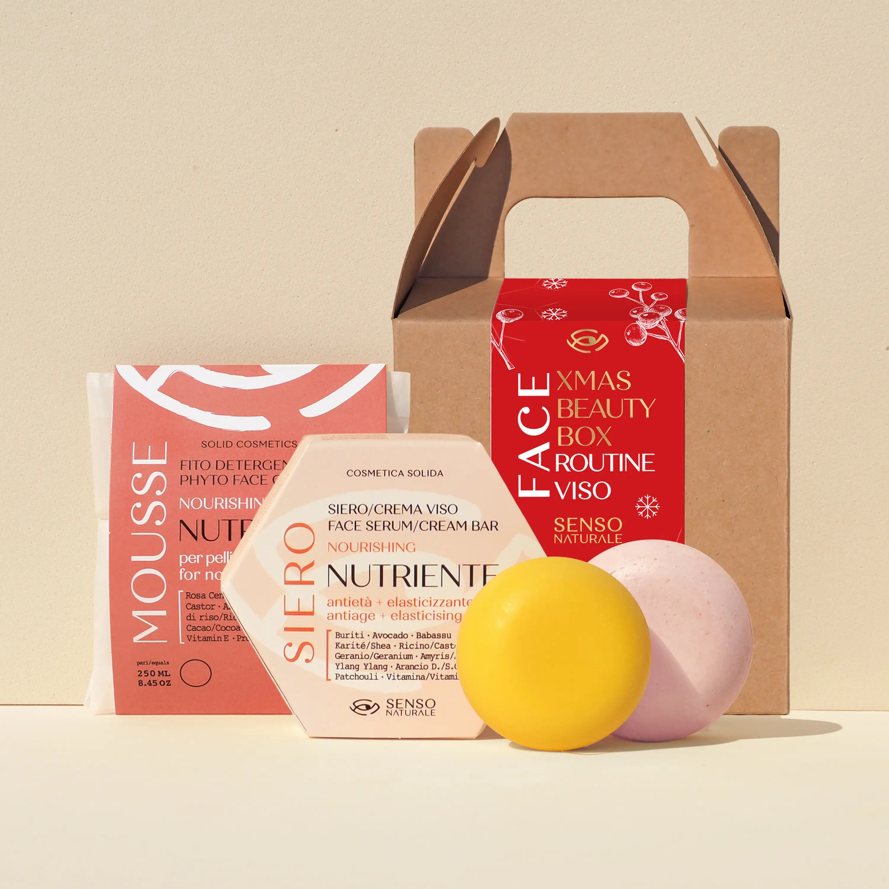 Kit viso nutriente antiage natalizio Senso Naturale per pelle matura con cosmetici solidi naturali, confezione regalo ecologica in stile natalizio, ideale come dono di bellezza sostenibile.