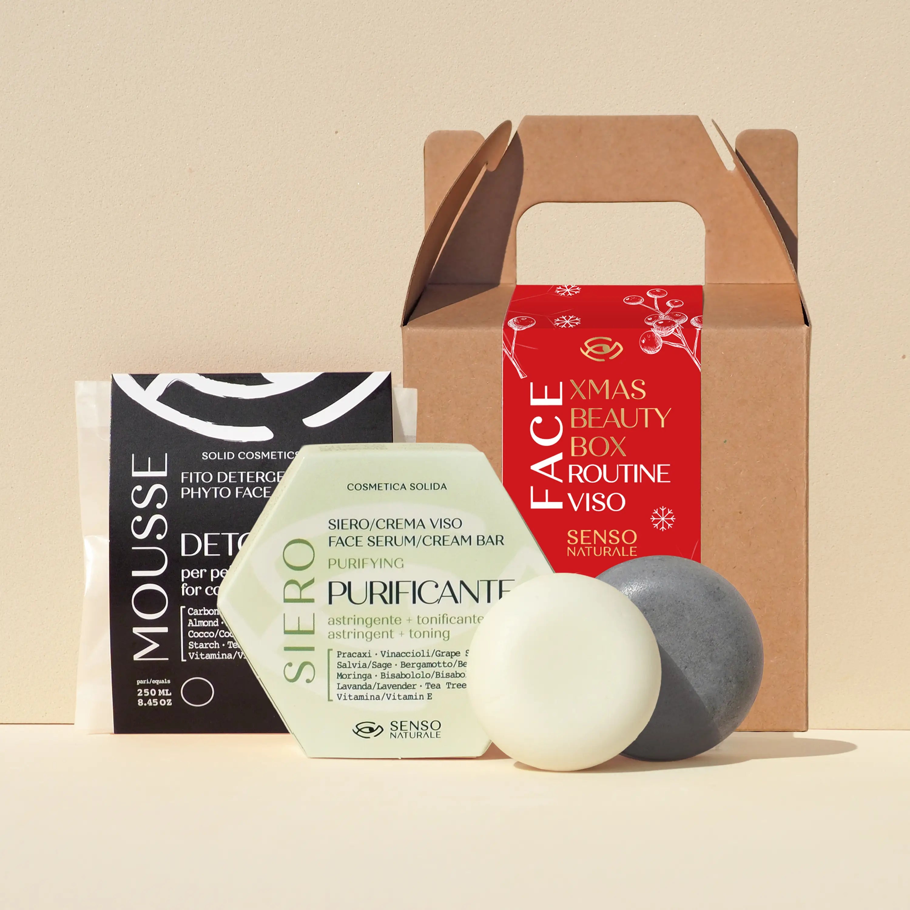 Kit viso purificante natalizio Senso Naturale per pelle grassa e impura con cosmetici solidi naturali, confezione regalo ecologica in stile natalizio, ideale come dono di bellezza sostenibile.